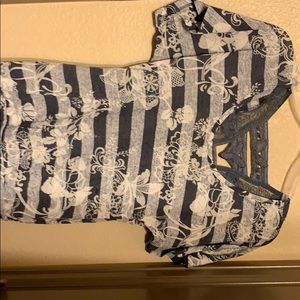 Short sleeved shirt with embroidery on back.